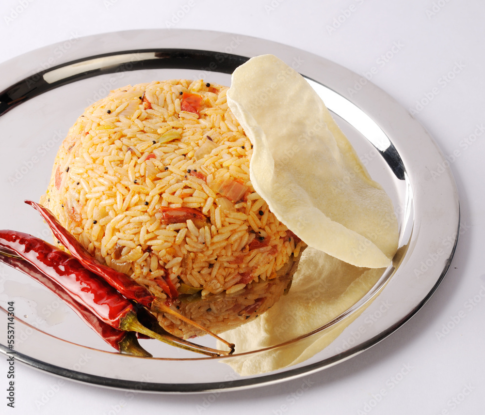 Tomato rice spicy South Indian rice. Rice cooked with tomato and herbs ...