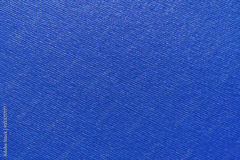 Blue ribbed colored craft paper texture with glitter effect Blue ribbed colored craft paper texture with glitter effect