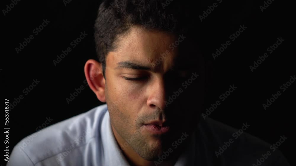 Face Of A Dissapointed Man Watching News On Television. Close Up Face Of A Dissapointed Man Watching News On Television. Close Up