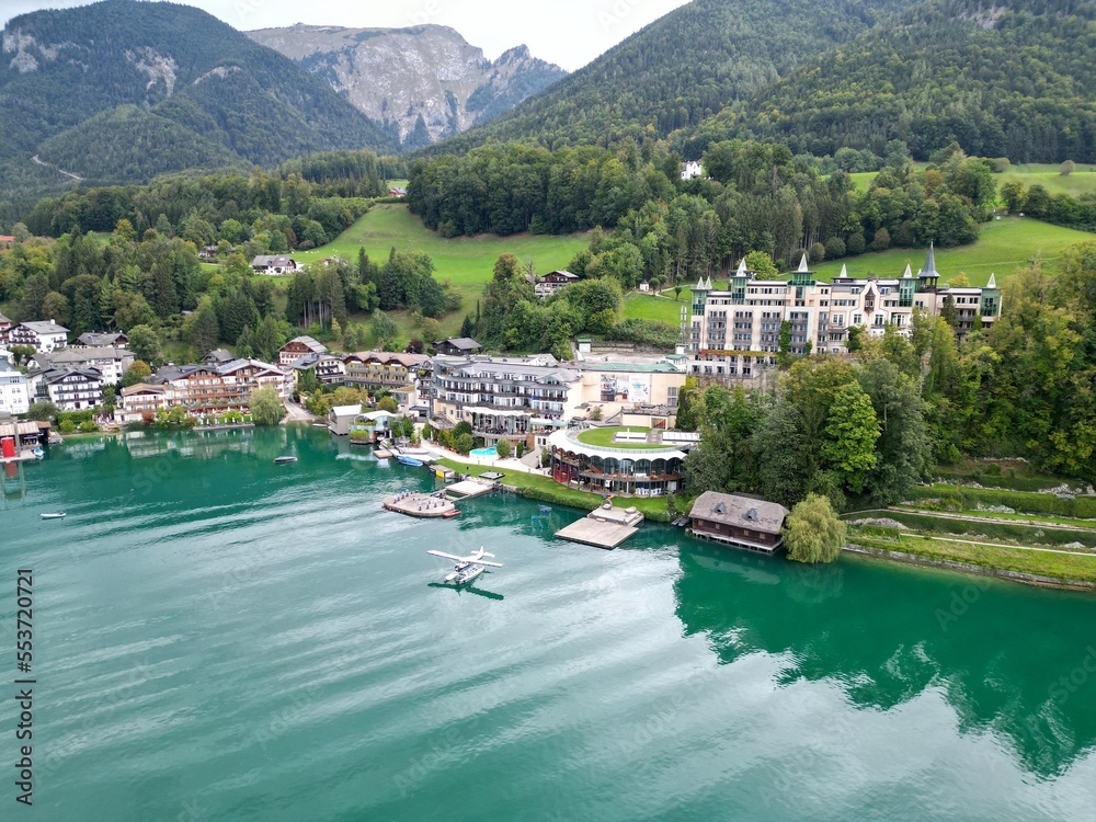 Fototapeta premium Sea plane moored St. Wolfgang Village, Austria drone aerial view