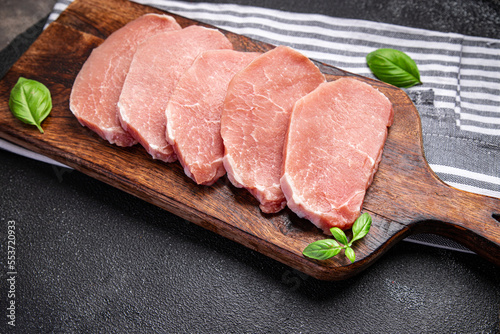 raw pork meat cut slice steak fresh meal food snack on the table copy space food background rustic top view photo