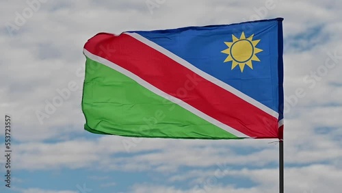 Closeup view of a Namibian flag waving in the wind