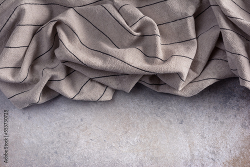 Background with kitchen runner, towel or napkin on grey concrete