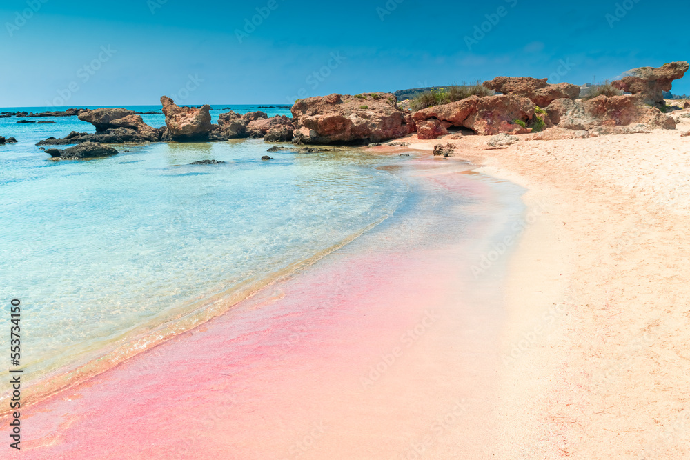 Amazing pink sand beach with crystal clear water in Elafonissi Beach, Crete, Greece