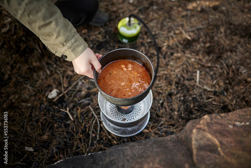 Wallpaper Mural Heating food on camping stove Torontodigital.ca
