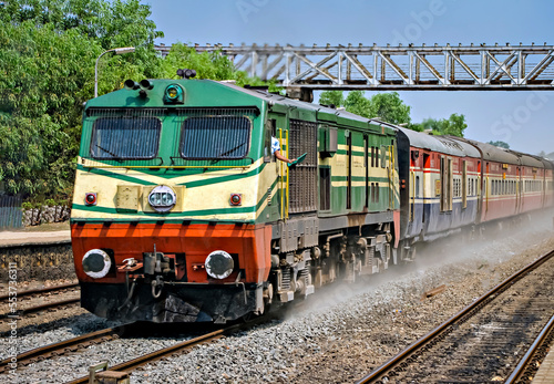 Obraz na plátně Indian Railway's prestigious, luxurious Rajdhani express passing through a small station, Kudal