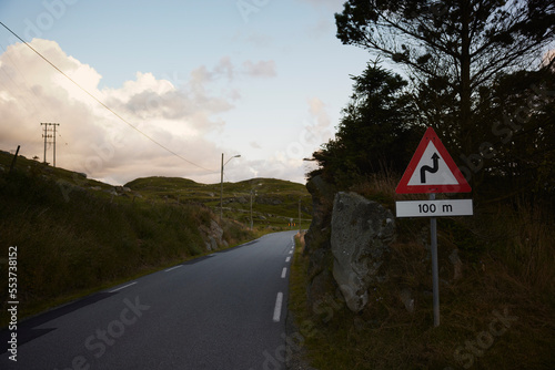 Warning sign at country road photo