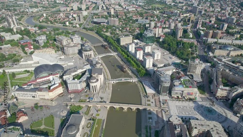 Aerial panoramic view of center architeture of Skopje, Macedonia. Panoramic view of the city center if Skopje, with Vardar river and bridges photo