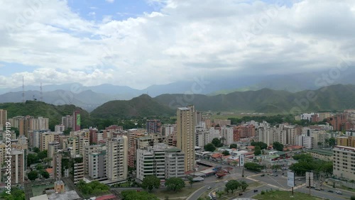 Aerial panoramic view of Maracay, the capital of of Aragua, Venezuela. The Caribbean city is surrounded by mountains photo