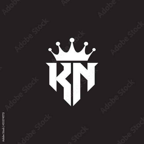 KN or NK logo monogram symbol shield with crown shape design vector