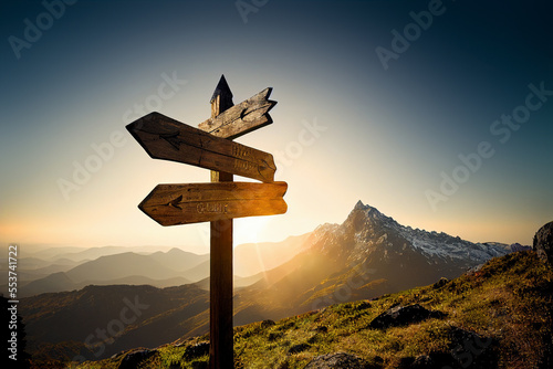 wooden signpost in the mountain photo