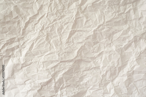 Crumpled white paper as a background.