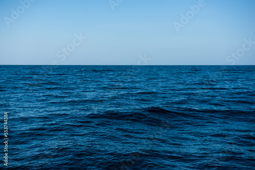 Blue sea on sky background