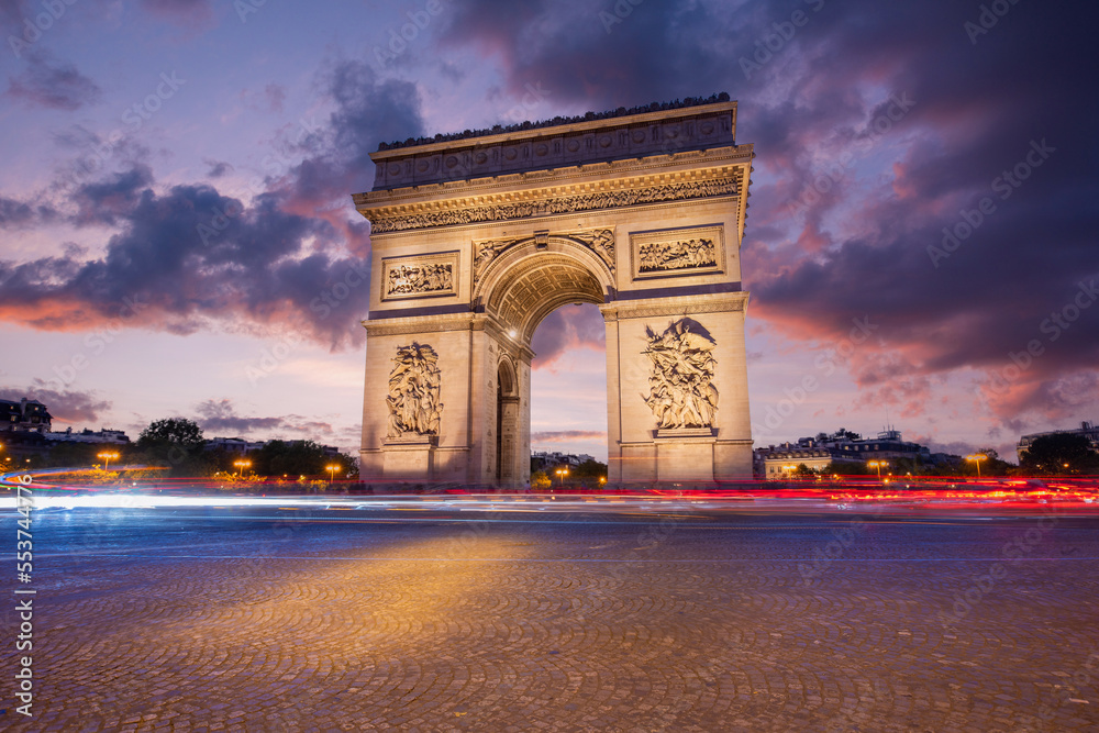 Arc de Triomphe(Arch of Triumph) Paris city at sunset. Long exposure panorama