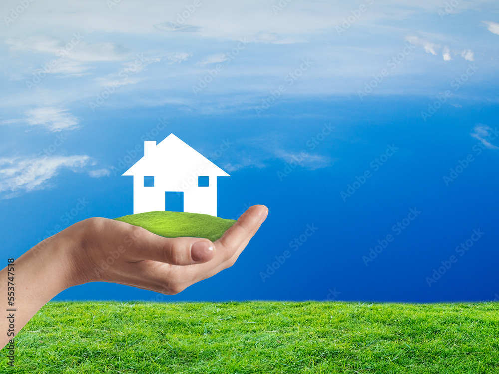 White home place over the hand, investment, finance and loan background White home place over the hand, investment, finance and loan background