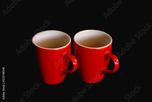 two cups of coffee on lack background