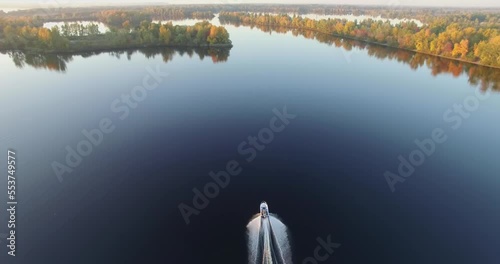 boat floating on river. jet boat tour on lake photo