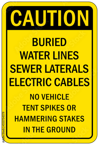 Buried cable warning sign and labels buried water lines sewer laterals electric cables no vehicle tent spike or hammering stakes in the round