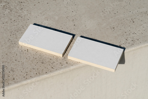 Blank business cards on a concrete background 