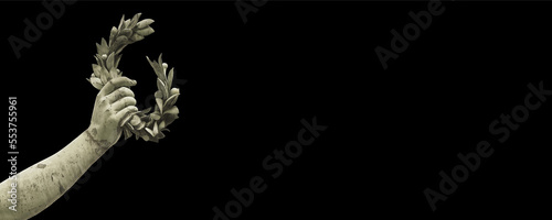 Schilderij op canvas Hand holds a laurel wreath - old traditional bronze statue on so