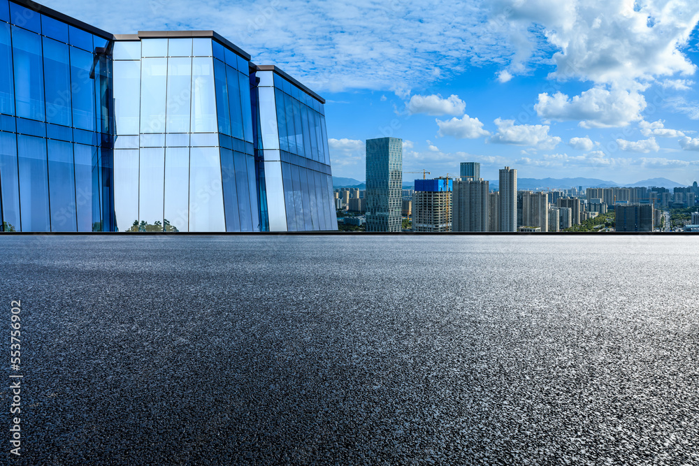Fototapeta premium Asphalt road and modern city skyline with buildings in Ningbo, Zhejiang Province, China. 