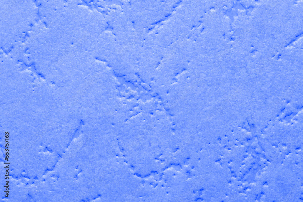 The texture with small patterns of blue. Closeup