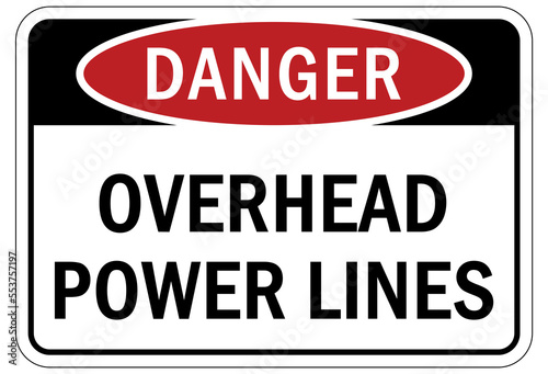 Overhead power lines sign and labels