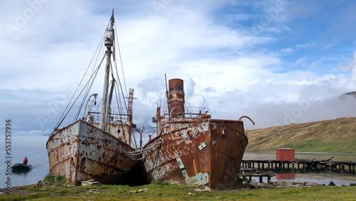 Old, rusted whaling and sealing ships beached in the harbor, at the old whaling station at Grytviken, South Georgia Island