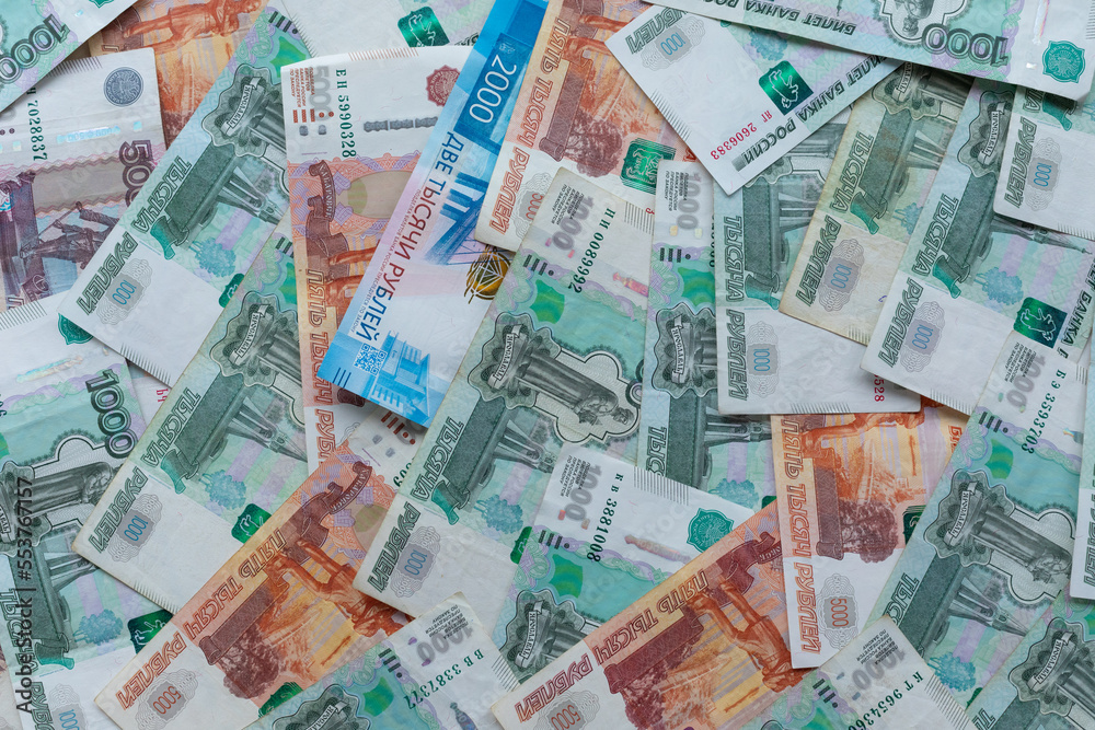 Russian money. Different denomination of bills. Close-up of Russian rubles. Finance concept. Money background and texture. Copy space. Russian money. Different denomination of bills. Close-up of Russian rubles. Finance concept. Money background and texture. Copy space.