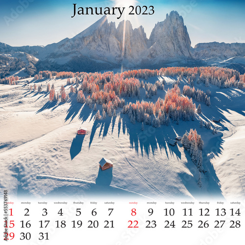 Square wall monthly calendar ready for print, January 2023. Set of calendars with beautiful landscapes. Aerial winter view from flying drone of Alpe di Siusi ski resort with Plattkofel peak, Ityaly. photo