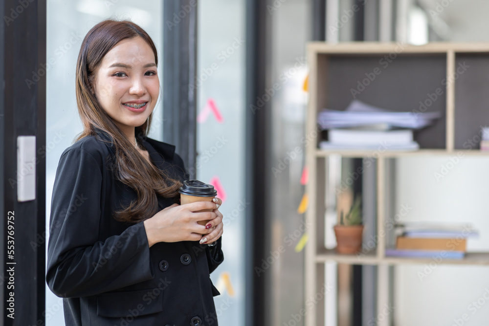 Portrait of Happy Beautiful Business Asian Woman in Office Portrait of Happy Beautiful Business Asian Woman in Office