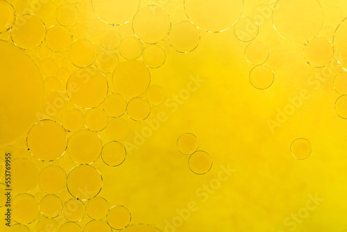 Bubbles of vegetable oil or fat in water. Olive oil in liquid