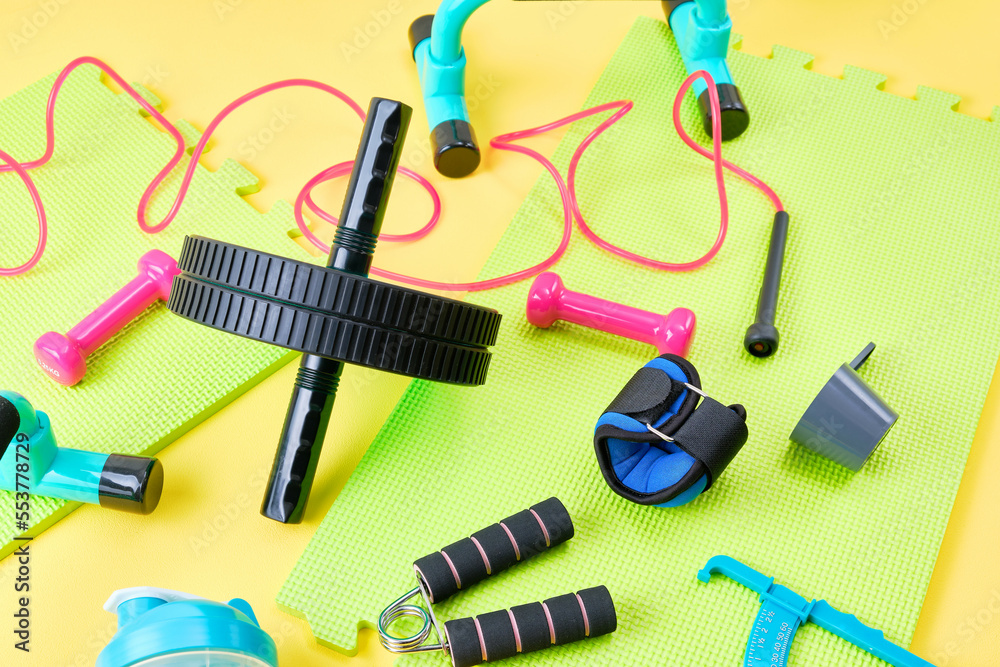 Fitness equipment on colorful mats.