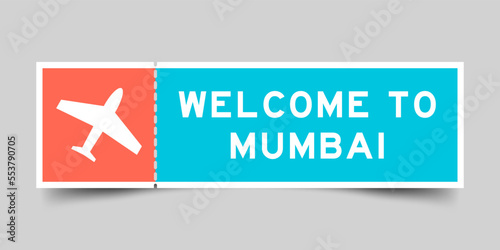 Orange and blue color ticket with plane icon and word welcome to mumbai on gray background