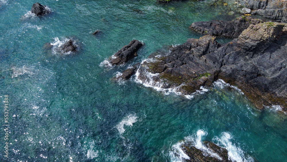 Beautiful sea rocks and turquoise water. Seascape top view. Beautiful places of Ireland. A natural attraction.