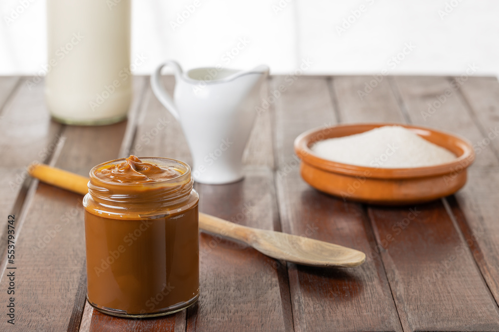 Dulce de leche, traditional sweet from Argentina with copy space. Dulce de leche, traditional sweet from Argentina with copy space.