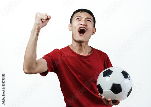 Young asian man soccer sport fans feeling happy after the cheering team wins.