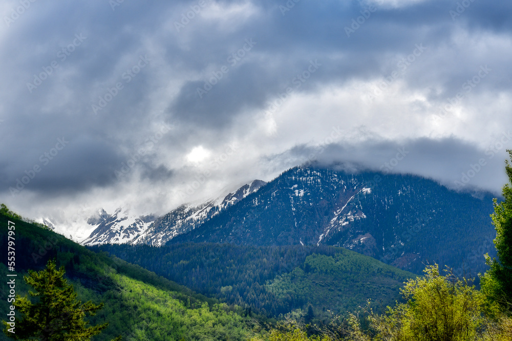 Fototapeta premium Clouds and storm high in the Colorado mountains