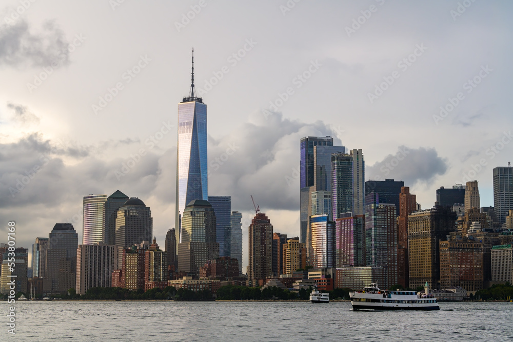 The financial district in the lower Manhattan in New York City with stormy clouds in background.