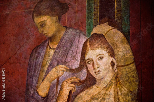 detail of the ancient painting in the Villa of the Mysteries in Pompeii. Pompeii was destroyed by the volcanic eruption in 79 BC