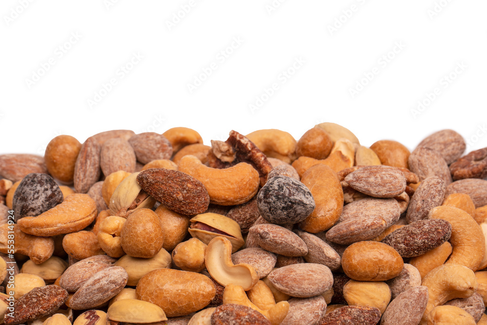 A group of almonds, pistachios, walnuts, macadamia, cashews. A group of almonds, pistachios, walnuts, macadamia, cashews.