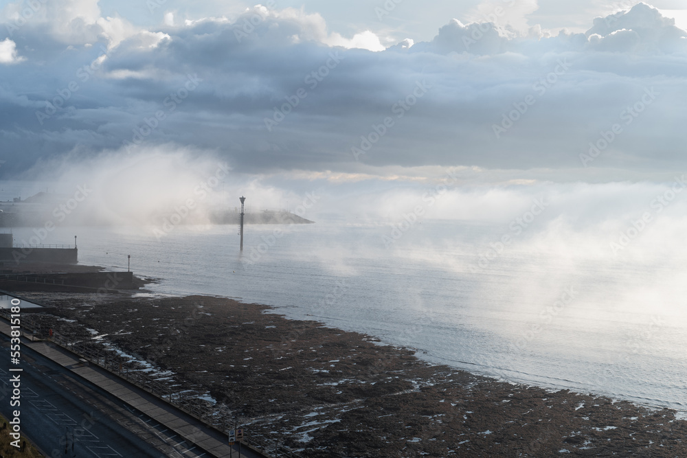 Sea mist rolling in on a freezing cold morning in Ramsgate, Kent, UK