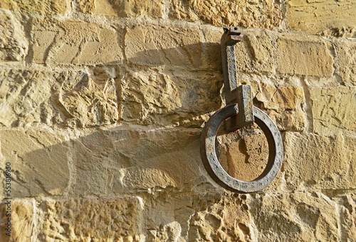 Metal decorative detail on the facade of a house in Florence photo