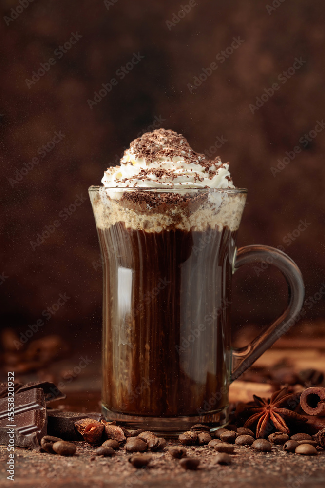 Coffee with whipped cream sprinkled with chocolate crumbs.