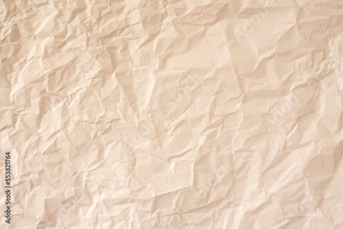 Crumpled warm paper as a background.