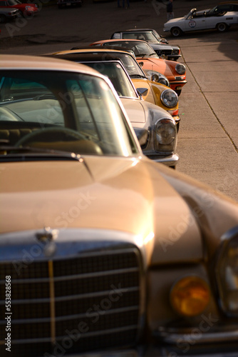 Parked cars, collector cars in a classic car race in Lu