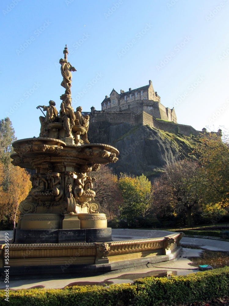 Autumnal view of Edinburgh Castle from Princes Street Gardens, with the Ross Fountain.