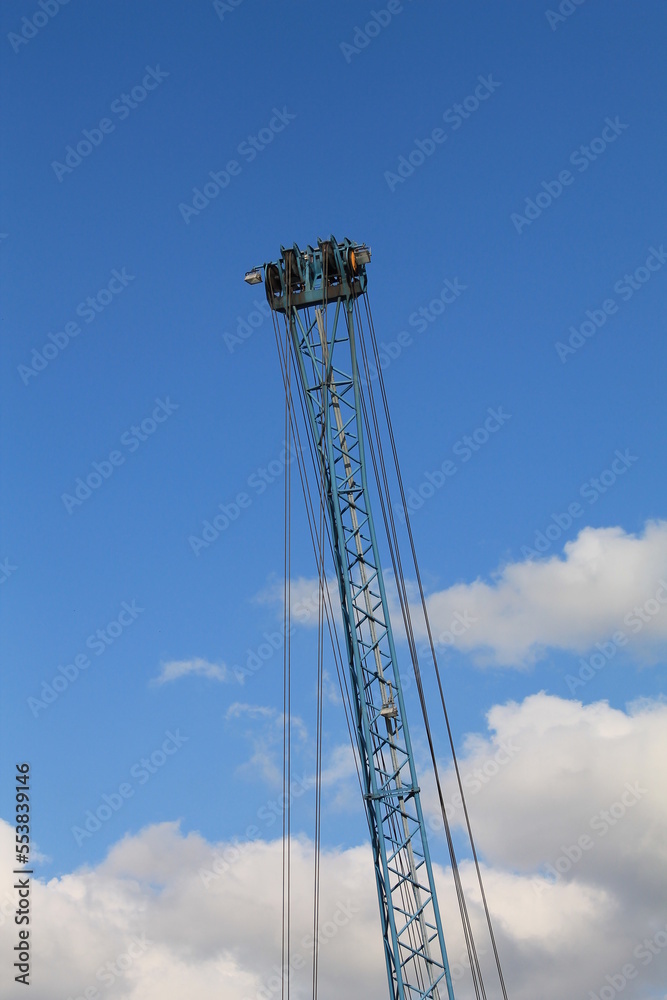 construction crane against blue sky