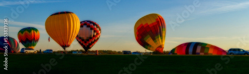 Hot Air Balloons lifting off in the morning