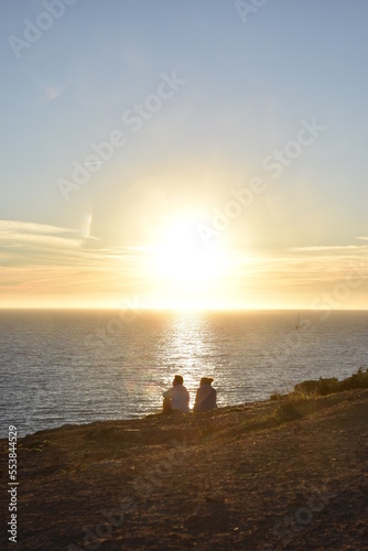 pair in sunset on the beach